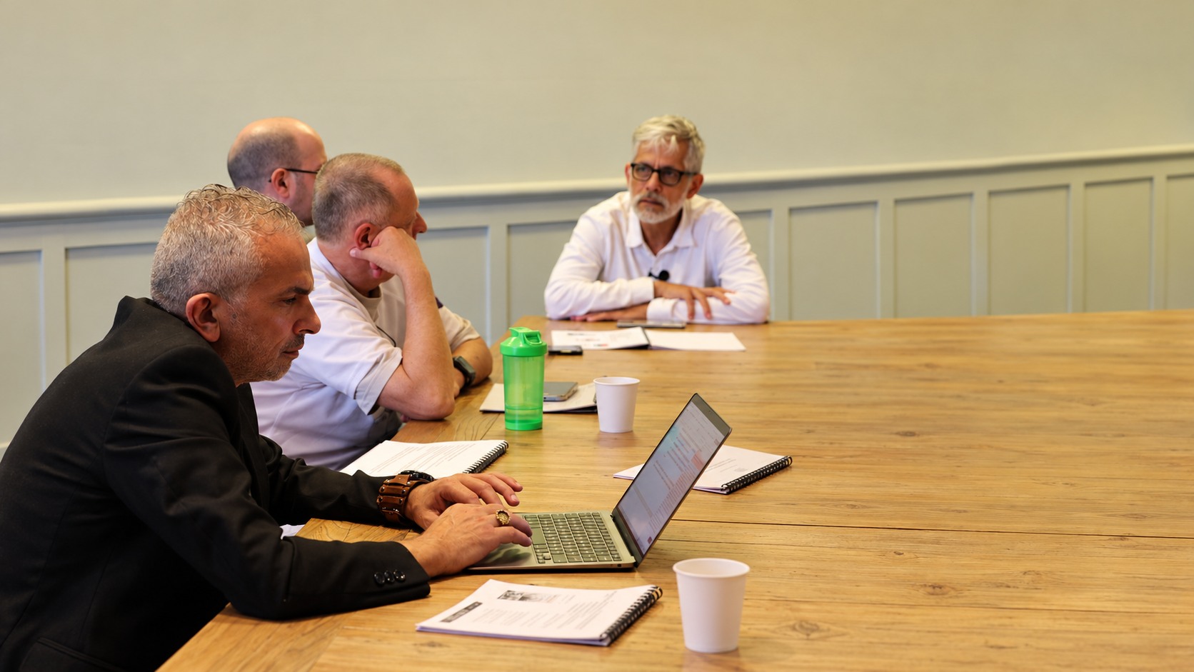 Participants at the expert discussion around a table, Tel Aviv, April 2024.