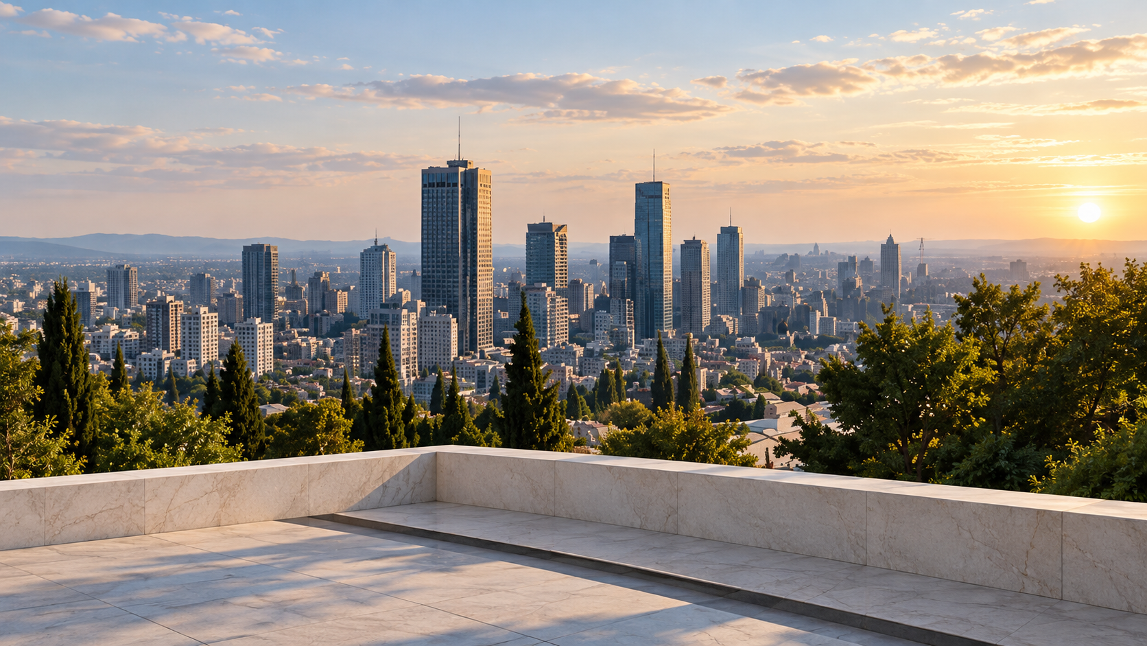 A modern Israeli city seen from an open stone terrace in soft evening light